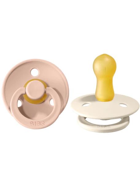 2 pacifiers, one in profile
