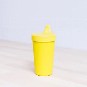 Yellow plastic sippy cup